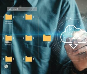 Visualization of a man using a touchscreen to move files into the cloud