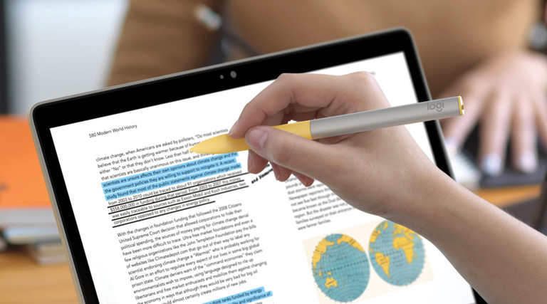 K–12 Student using logitech pen with chromebook touchscreen