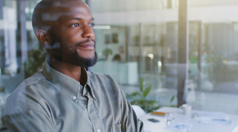 Person looking out of office