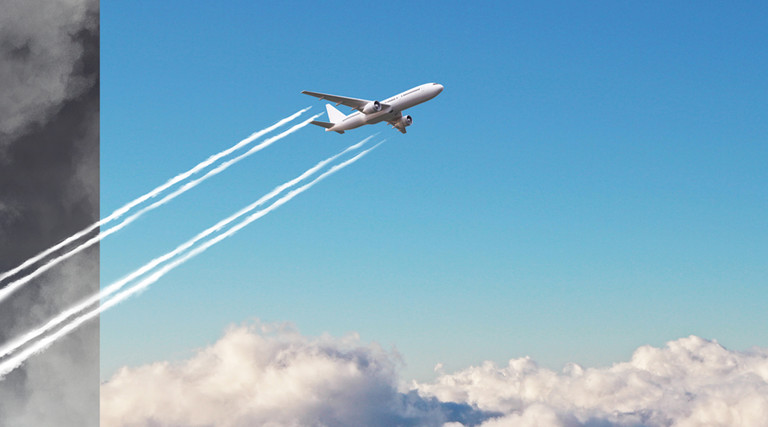 Plane at grey and blue sky background
